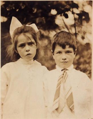[girl and boy wearing white]