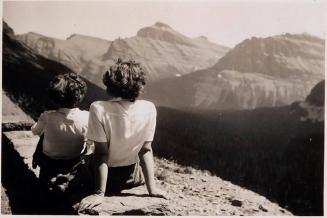 [backs of two women looking at mountains]