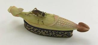 Model of a Corn Cob with Insect with Brocade Stand