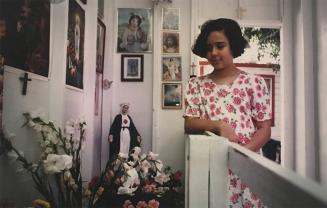 Miraida Martinez Stands in the Shrine...