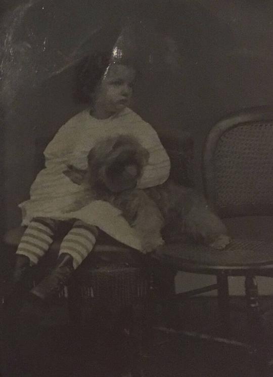 [Young Child with Dog]
