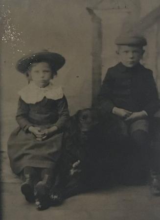 [Two Children with Dog]