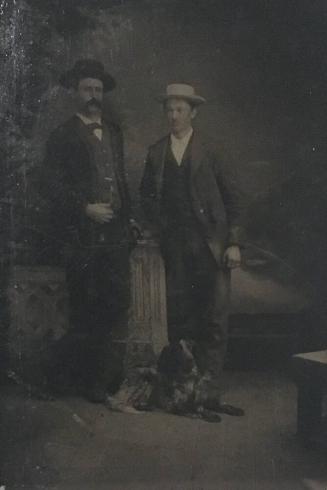 [Two Men with Dog]