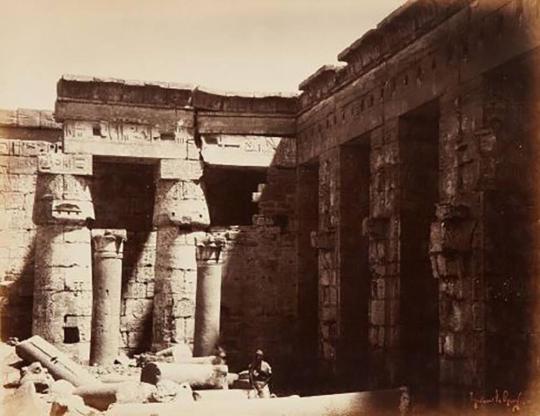 Temple of Medinet Habu in Thebes with a Man