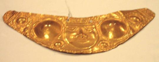 Crescent-shaped Pectoral with Face and Bosses