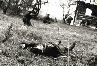 The guerrillas knock out the punitive detachment of the Nazis from the village. Leningrad region, Russia, USSR.