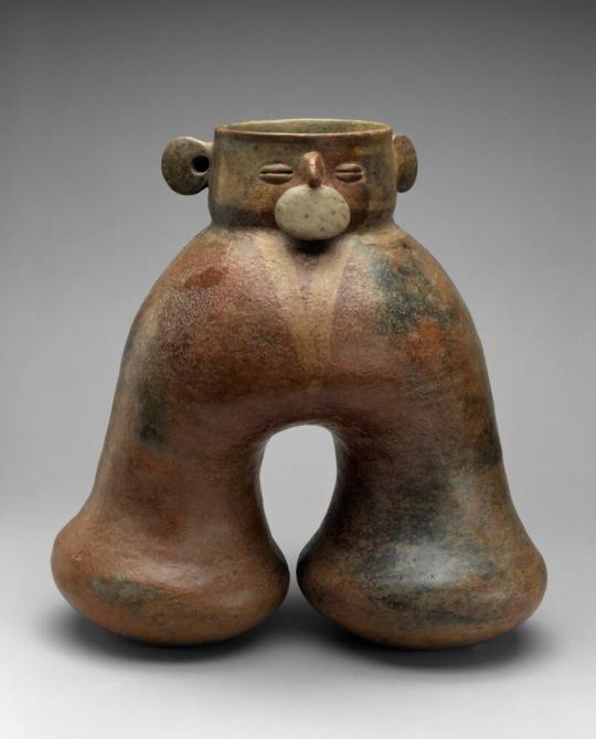 Human-headed Jar with Two Leg Chambers