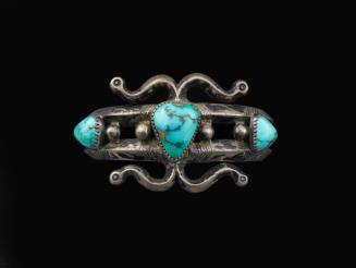 Bracelet with Turquoise Settings and Scrolls