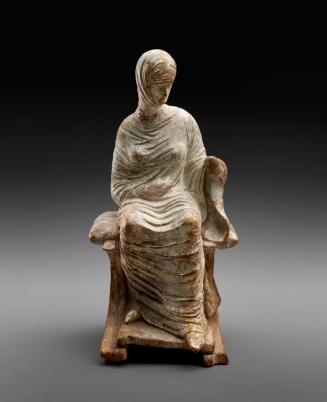 Statuette of a Seated Draped Female Figure