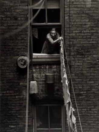 Woman Hanging Clothes