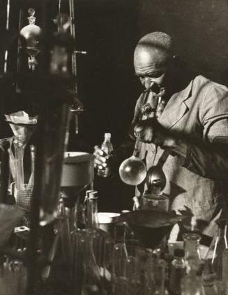 George Washington Carver in His Lab