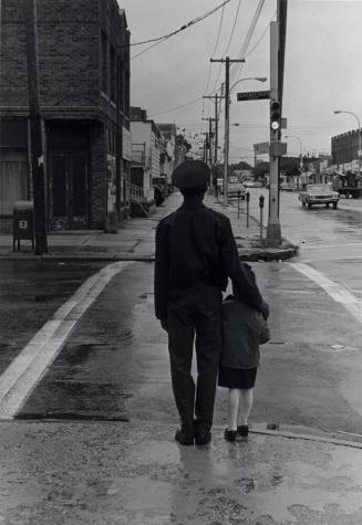 Man and Girl at Crossing