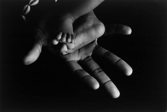 Man's Hand, Baby's Feet