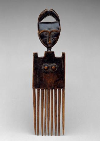 Comb with Female Head and Torso