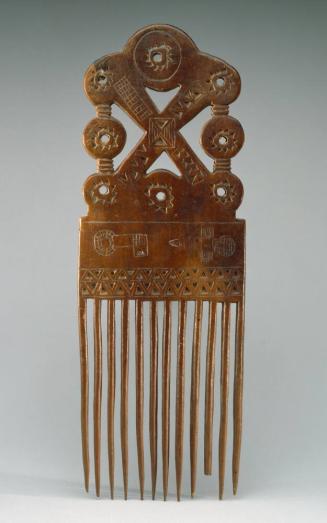 Comb with Knife (?) and Key