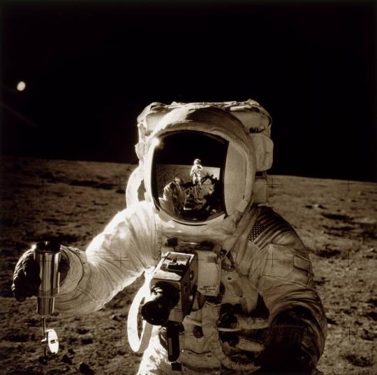Mission: Apollo-Saturn 12: Alan L. Bean collecting lunar samples during second lunar landing