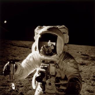 Mission: Apollo-Saturn 12: Alan L. Bean collecting lunar samples during second lunar landing