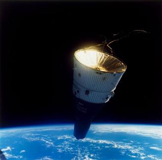 Mission: Gemini-Titan VI-A and VII: Gemini VII in orbit, as seen from Gemini VI crew during the first spacecraft rendezvous