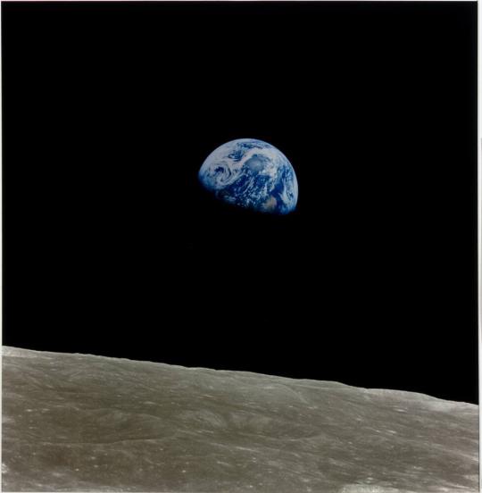 Mission: Apollo-Saturn 8, December 21–27, 1968: Earthrise, the planet Earth seen rising above the surface of the moon, by Frank Borman, James A. Lovell, and William A. Anders the first men to orbit the moon.