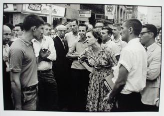 Atlanta, Georgia, Winter 1963-64, An Anonymous Woman, Who Has Come Upon a Mob Abusing Demonstrators, with Kicks, Blows, and Burning Cigarettes