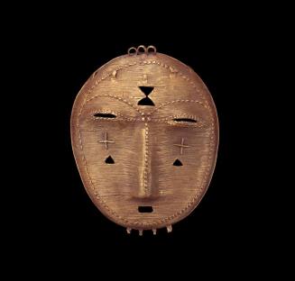 Pendant in the form of a mask