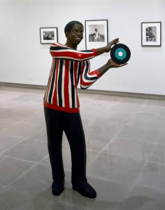 Standing Man with a Record Album