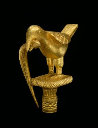 Linguist Staff Finial Representing a Bird with a Snake in its Mouth