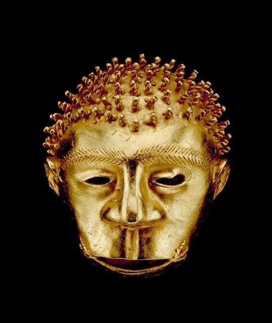 Sword Ornament of a Human Head