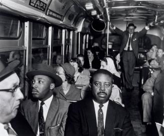 First Desegregated Bus Ride. Dr. Martin Luther King and Rev. Ralph Abernathy on first desegrated bus. Montgomery, Alabama.