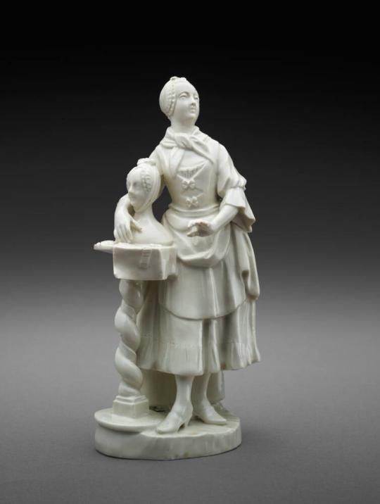 Figure of a Milliner