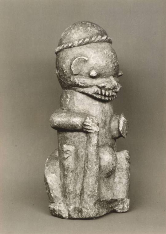 Figure of a Man Holding a Staff