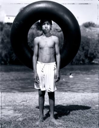 Boy with Inner Tube