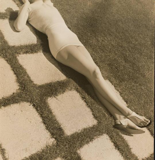 Woman Lying on Grass