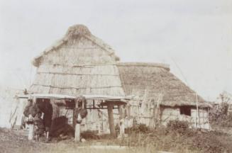 Ainu Storehouse with Ainu Children