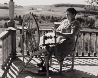 Fort Kent, Me. (Vicinity).  Wife of Albert Gagnon, Acadian FSA Client, Spinning Domestic Wool for Knitting