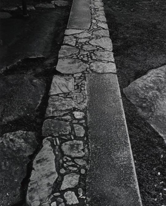 Formal Stone Pavement in front of the Waiting Bench