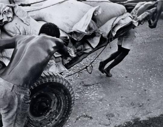 Two Men Pushing a Cart, Haiti