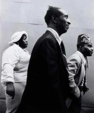 Three People Walking, New York