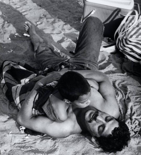 Man Holding a Child, Coney Island, New York