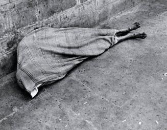 Person Covered with Blanket, India
