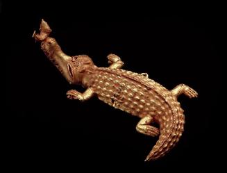 Sword Ornament in the form of a Crocodile with Mudfish