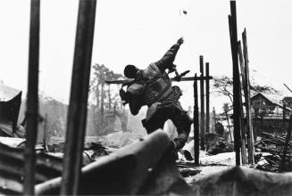 Shell-shocked soldier awaiting transportation away from the