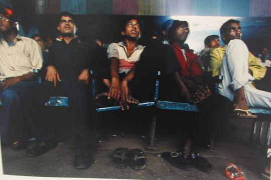 Five Men Watching a Film at Alfred's Theater in Bombay, India