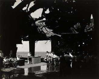 Religious services under the blasted flight deck of the USS Franklin