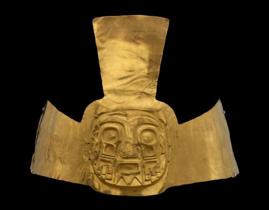 Crown ornament depicting the face of the Sun God