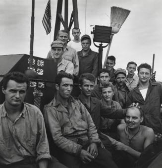 Wounded gunner Kenneth Bratton is lifted from the turret of a torpedo ...