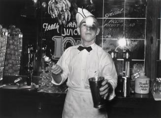 Soda jerker flipping ice cream into malted milk shakes. Corpus Christi, Texas