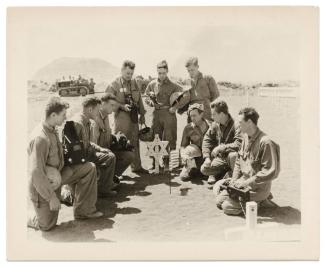 5th Marine Division Photographers at the grave of PFC Don Fox, USMCR, Iwo Jima
