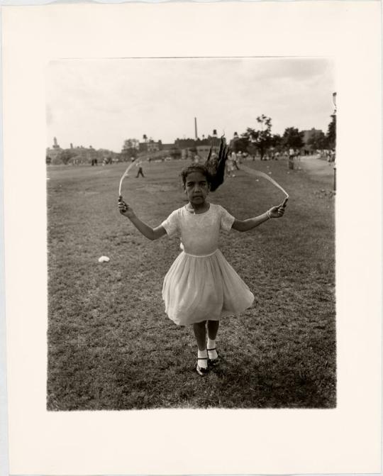 Child skipping rope at a Puerto Rican Festival, N.Y.C. 1963