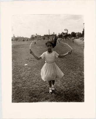 Child skipping rope at a Puerto Rican Festival, N.Y.C. 1963